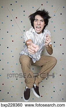 Stock Photography - teenage boy punching 
mid-air. fotosearch 
- search stock 
photos, pictures, 
images, and photo 
clipart
