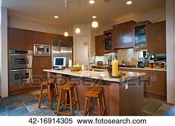 Stock Image - contemporary kitchen 
with wood cabinets 
and marble countertops. 
fotosearch - search 
stock photos, 
pictures, images, 
and photo clipart