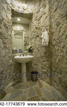 Stock Photograph - curved, stone-lined 
washroom. fotosearch 
- search stock 
photos, pictures, 
images, and photo 
clipart