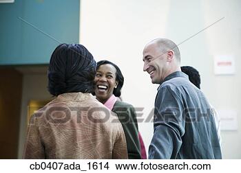 Stock Photo - group of business 
executives smiling. 
fotosearch - search 
stock photos, 
pictures, images, 
and photo clipart