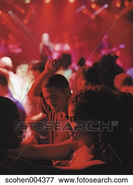 Picture - larger group of 
people dancing 
in disco. fotosearch 
- search stock 
photos, pictures, 
images, and photo 
clipart