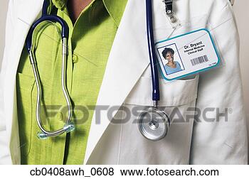 Stock Photo - mid section view 
of mid adult female 
doctor. fotosearch 
- search stock 
photos, pictures, 
images, and photo 
clipart