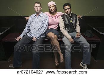Picture - young woman sitting 
with two young 
men. fotosearch 
- search stock 
photos, pictures, 
images, and photo 
clipart