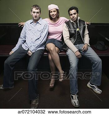 Stock Photo - young woman sitting 
with two young 
men. fotosearch 
- search stock 
photos, pictures, 
images, and photo 
clipart