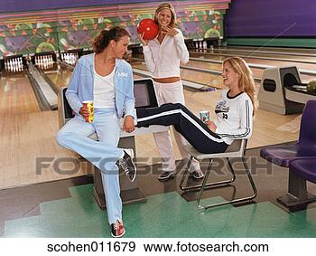 Stock Photograph - three young women 
at a bowling alley. 
fotosearch - search 
stock photos, 
pictures, images, 
and photo clipart