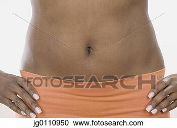 Stock Photography - view of a woman's 
midriff. fotosearch 
- search stock 
photos, pictures, 
images, and photo 
clipart