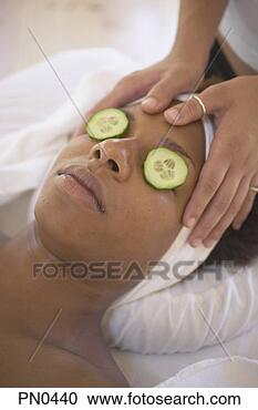 Stock Photography - young woman getting 
a facial treatment 
in a health clinic. 
fotosearch - search 
stock photos, 
pictures, images, 
and photo clipart