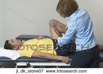 Picture - arthritic patient 
undergoing physical 
therapy in a clinic. 
fotosearch - search 
stock photos, 
pictures, images, 
and photo clipart