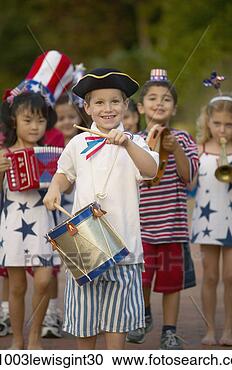 Stock Photography - children playing 
musical instruments 
in a parade. fotosearch 
- search stock 
photos, pictures, 
images, and photo 
clipart