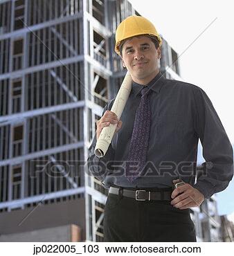 Stock Photo - portrait of an 
engineer standing 
near a construction 
site. fotosearch 
- search stock 
photos, pictures, 
images, and photo 
clipart