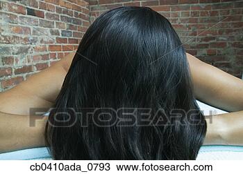 Stock Photo - young woman lying 
down in a health 
spa. fotosearch 
- search stock 
photos, pictures, 
images, and photo 
clipart