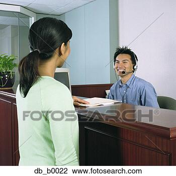 Stock Photo - businesswoman 
giving a document 
to a customer 
service representative. 
fotosearch - search 
stock photos, 
pictures, images, 
and photo clipart