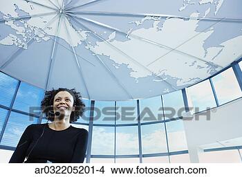 Stock Photo - low angle view 
of a businesswoman 
smiling. fotosearch 
- search stock 
photos, pictures, 
images, and photo 
clipart