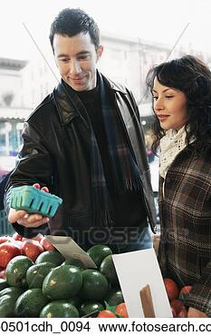 Stock Photo - mid adult couple 
shopping in a 
supermarket. fotosearch 
- search stock 
photos, pictures, 
images, and photo 
clipart