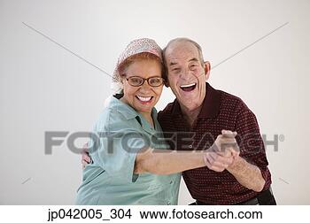Stock Photo - portrait of a 
senior couple 
dancing. fotosearch 
- search stock 
photos, pictures, 
images, and photo 
clipart