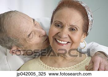 Stock Image - portrait of a 
senior man kissing 
a senior woman. 
fotosearch - search 
stock photos, 
pictures, images, 
and photo clipart