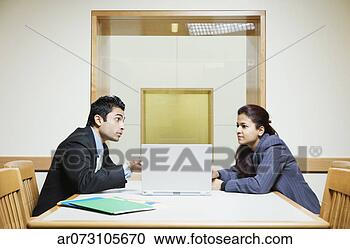 Stock Photography - executives in 
a meeting. fotosearch 
- search stock 
photos, pictures, 
images, and photo 
clipart