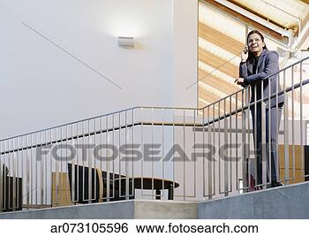 Stock Photo - female executive 
on mobile. fotosearch 
- search stock 
photos, pictures, 
images, and photo 
clipart