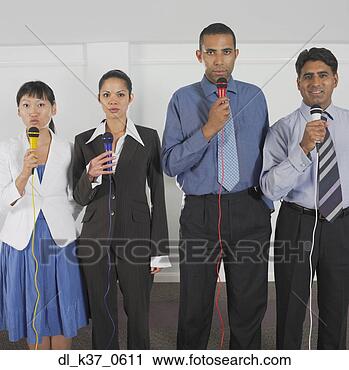 Stock Photography - four business 
people with microphones. 
fotosearch - search 
stock photos, 
pictures, images, 
and photo clipart