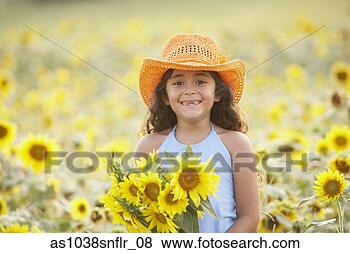 Stock Photo - girl standing 
in sunflower field. 
fotosearch - search 
stock photos, 
pictures, images, 
and photo clipart