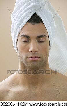Picture - man with eyes 
closed and towel 
around head. fotosearch 
- search stock 
photos, pictures, 
images, and photo 
clipart