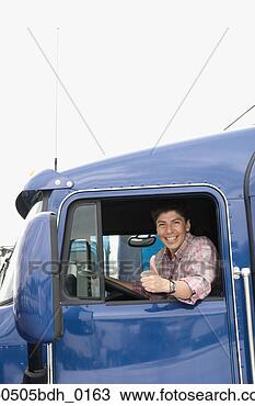 Stock Photo - man sitting in 
truck cab. fotosearch 
- search stock 
photos, pictures, 
images, and photo 
clipart