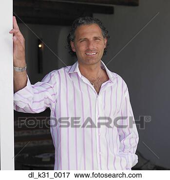 Picture - mature man smiling 
in doorway. fotosearch 
- search stock 
photos, pictures, 
images, and photo 
clipart