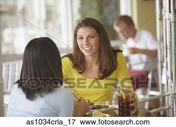Picture - woman having lunch 
with friend. fotosearch 
- search stock 
photos, pictures, 
images, and photo 
clipart