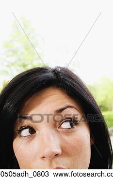 Stock Photo - woman looking 
sideways. fotosearch 
- search stock 
photos, pictures, 
images, and photo 
clipart