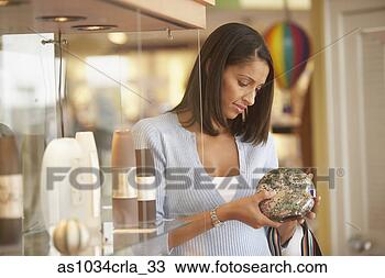Stock Photo - woman shopping 
in gallery. fotosearch 
- search stock 
photos, pictures, 
images, and photo 
clipart