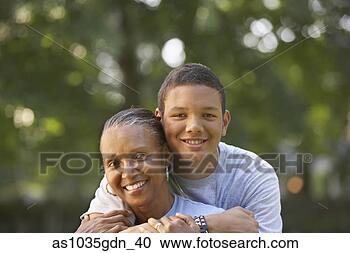 Stock Photography - woman and teenage 
boy. fotosearch 
- search stock 
photos, pictures, 
images, and photo 
clipart