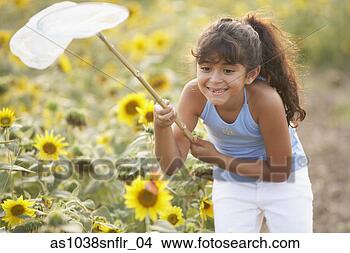 Stock Photo - young girl with 
butterfly net. 
fotosearch - search 
stock photos, 
pictures, images, 
and photo clipart