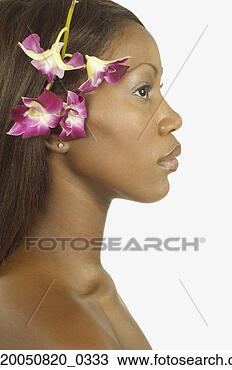 Stock Photo - young woman wearing 
flowers on her 
head. fotosearch 
- search stock 
photos, pictures, 
images, and photo 
clipart