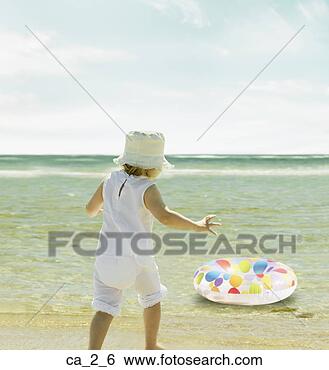 Stock Photo - little girl watching 
her inner tube 
float away. fotosearch 
- search stock 
photos, pictures, 
images, and photo 
clipart