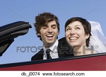 Stock Photo - portrait of bride 
and groom in convertable. 
fotosearch - search 
stock photos, 
pictures, images, 
and photo clipart