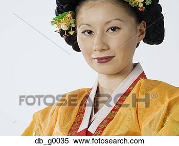 Stock Image - young asian woman 
in traditional 
dress. fotosearch 
- search stock 
photos, pictures, 
images, and photo 
clipart