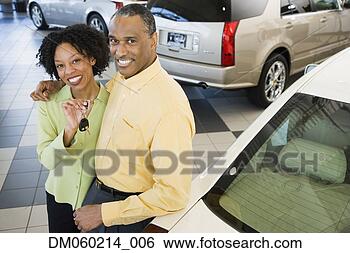 Stock Photo - couple buying 
a car. fotosearch 
- search stock 
photos, pictures, 
images, and photo 
clipart
