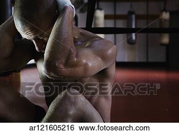 Stock Photo - male athlete doing 
sit-ups. fotosearch 
- search stock 
photos, pictures, 
images, and photo 
clipart