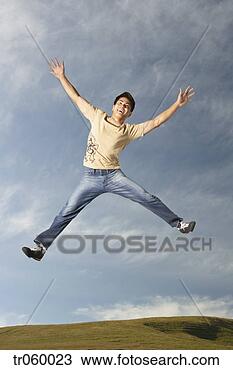 Stock Photo - man jumping for 
joy. fotosearch 
- search stock 
photos, pictures, 
images, and photo 
clipart