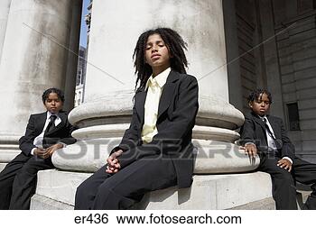 Stock Photo - students sitting 
on stone pillar. 
fotosearch - search 
stock photos, 
pictures, images, 
and photo clipart