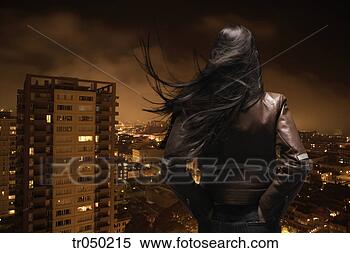 Stock Image - woman overlooking 
urban area. fotosearch 
- search stock 
photos, pictures, 
images, and photo 
clipart