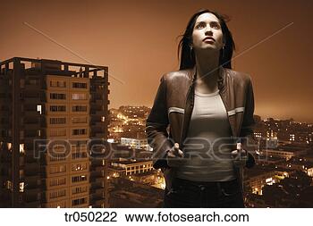 Stock Photo - woman overlooking 
urban area. fotosearch 
- search stock 
photos, pictures, 
images, and photo 
clipart