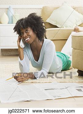 Stock Photography - young woman talking 
on the phone. 
fotosearch - search 
stock photos, 
pictures, images, 
and photo clipart