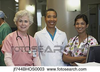 Stock Photo - african female 
doctor with female 
nurses,  bethesda, 
 maryland. fotosearch 
- search stock 
photos, pictures, 
images, and photo 
clipart