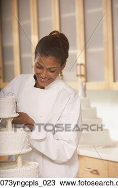 Stock Photo - african female 
pastry chef next 
to a wedding cake, 
 richmond. fotosearch 
- search stock 
photos, pictures, 
images, and photo 
clipart