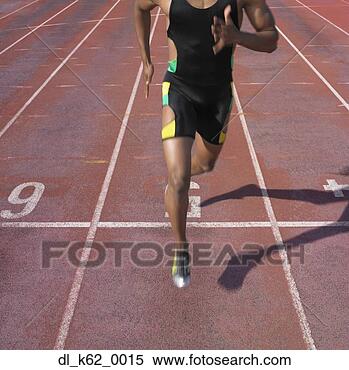 Stock Image - african male athlete 
running on track, 
perth, australia. 
fotosearch - search 
stock photos, 
pictures, images, 
and photo clipart
