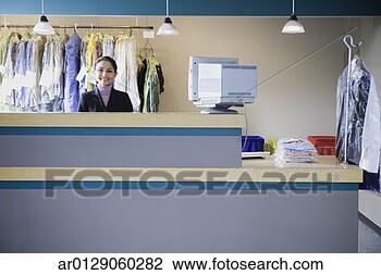 Stock Photo - asian businesswoman 
at drycleaner, 
edmonds, washington, 
united states. 
fotosearch - search 
stock photos, 
pictures, images, 
and photo clipart