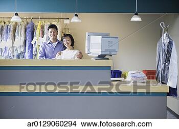 Stock Photo - asian male and 
female drycleaners, 
edmonds, washington, 
united states. 
fotosearch - search 
stock photos, 
pictures, images, 
and photo clipart