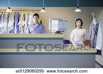 Stock Image - asian male and 
female drycleaners, 
edmonds, washington, 
united states. 
fotosearch - search 
stock photos, 
pictures, images, 
and photo clipart
