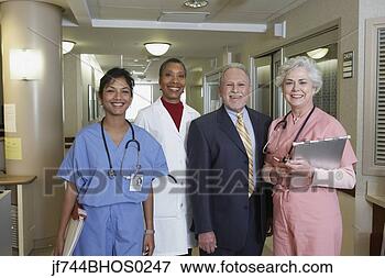 Picture - businessman with 
hospital staff 
in hospital,  
bethesda,  maryland. 
fotosearch - search 
stock photos, 
pictures, images, 
and photo clipart